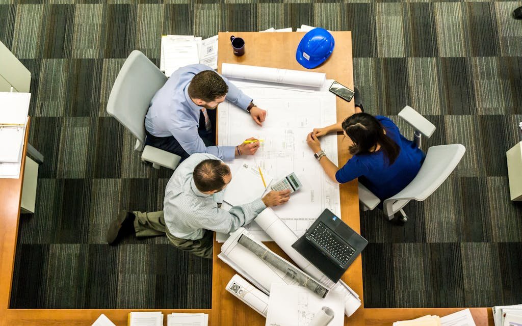 Person Signing in Documentation Paper